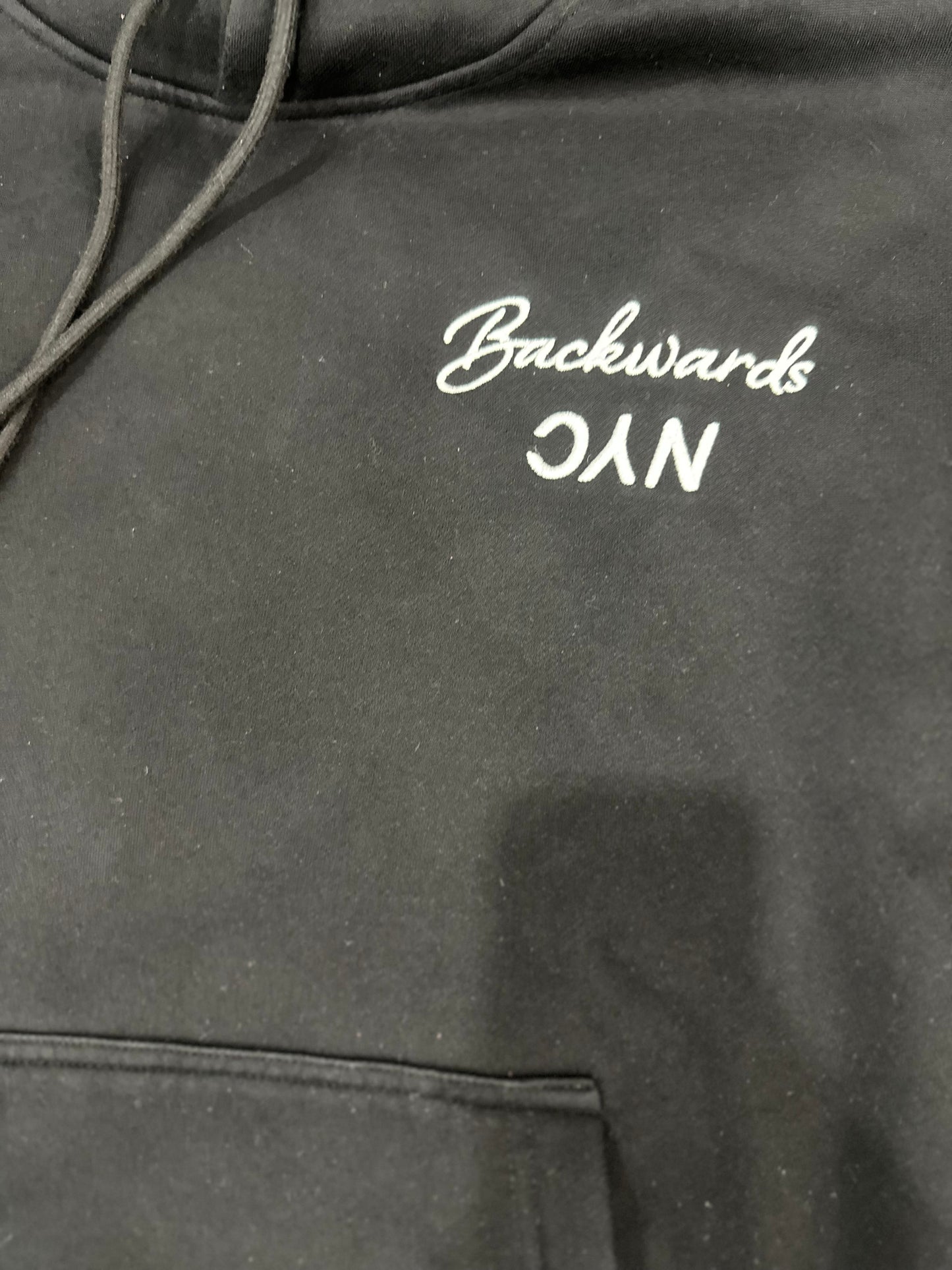 BackwardsNYC Ultimate Comfort and Style: Premium Fabric Hoodie for Men/Women. White on Black, Left Chest